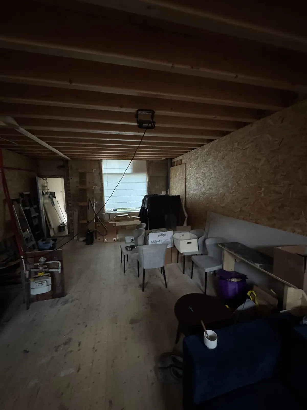 Zicht door de begane grond met open plafondconstructie